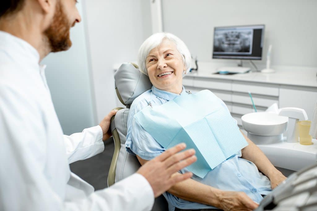 woman getting a dental exam in Spring Valley, CA